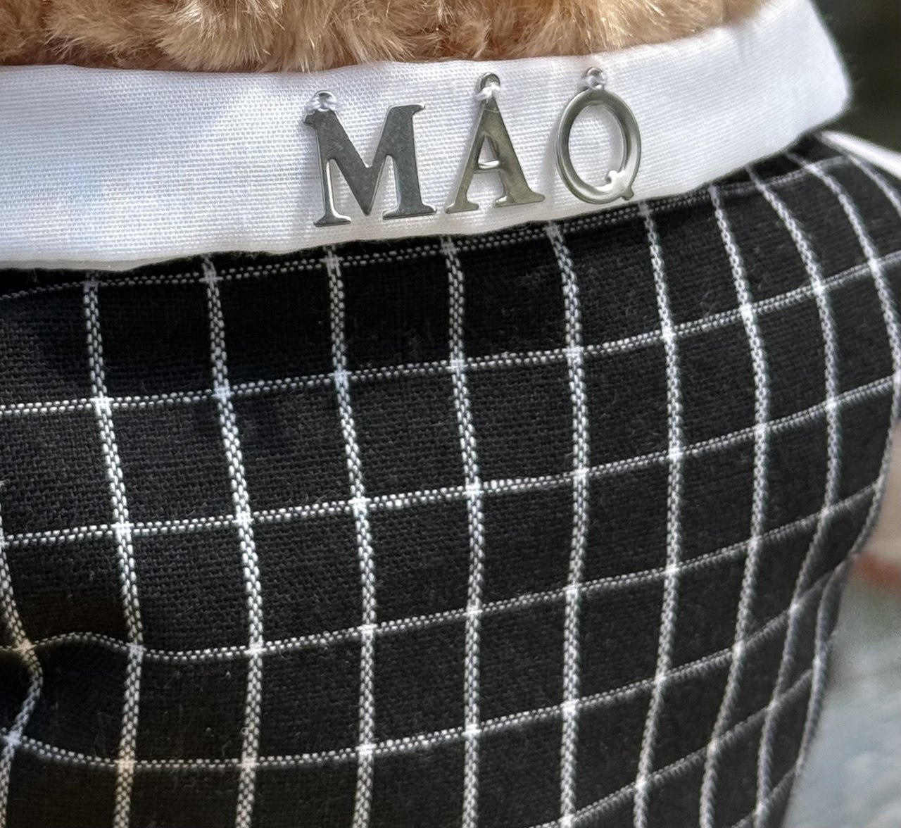 Accountant Bear — A charming handcrafted teddy bear in a sharp plaid suit, bow tie, and carrying a Casio calculator. Personalised with a name — the most unique gift for an accountant or finance graduate.